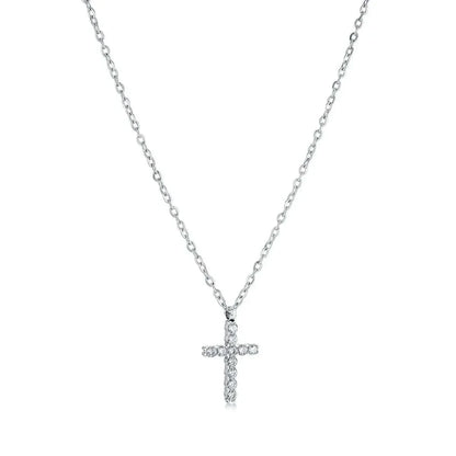 Silver crucifix pendant necklace with cubic zirconia stones on delicate chain